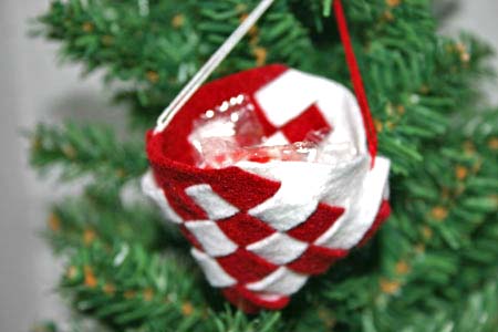 Easy Christmas Crafts Felt Basket red and white filled with candy on the tree