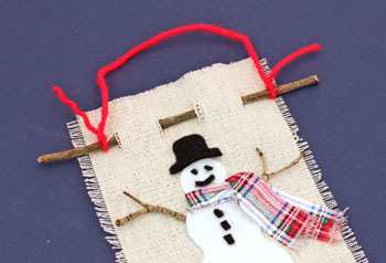Easy Christmas Crafts Felt and Twig Snowman step 12 add yarn