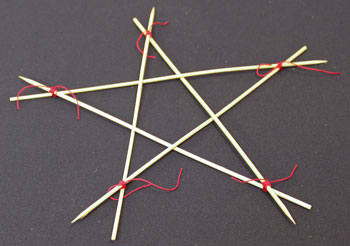 Easy Christmas Crafts Five Point Wooden Star step 8 wrap and secure yarn around each point