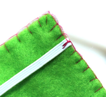 Easy Felt Crafts Notepad Cover2 step 16a sew multiple stitches at elastic