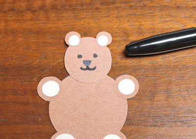 Paper Circles Teddy Bear step 12 draw eyes and mouth