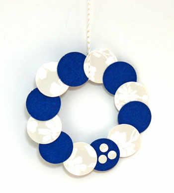 Circle Wreath Ornament blue and white on display