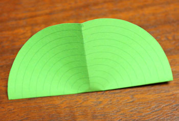 Cut Paper Circle Ornament step 3 fold opposite half