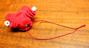 Felt and Bead Elf step 14 insert yarn and make loop
