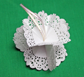 Folded Paper Doily Ornament step 11 glue around the loop