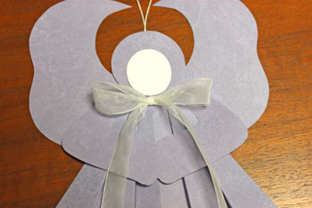 Folded Square Paper Angel step 15 position bow