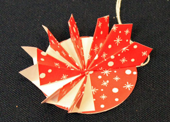 Easy Christmas Crafts Paper Pinwheel Wreath Ornament step 15 third quadrant finished