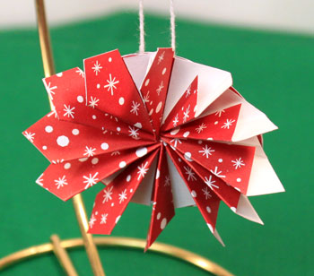 Easy Christmas Crafts Paper Pinwheel Wreath Ornament step 17 finished and hanging ornament