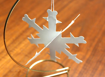 3D Paper Snowflake hanging on display