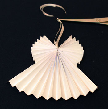Easy Angel Crafts Accordian Folded Paper Angel Ornament Step 10 tie ribbon