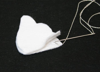 Easy Angel Crafts Angel Gift Bag begin sewing one set of wing shapes together