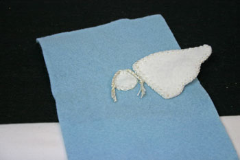 Easy Angel Crafts Angel Gift Bag finish attaching first wing shape