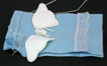 Easy Angel Crafts Angel Gift Bag begin sewing front and back of bag together