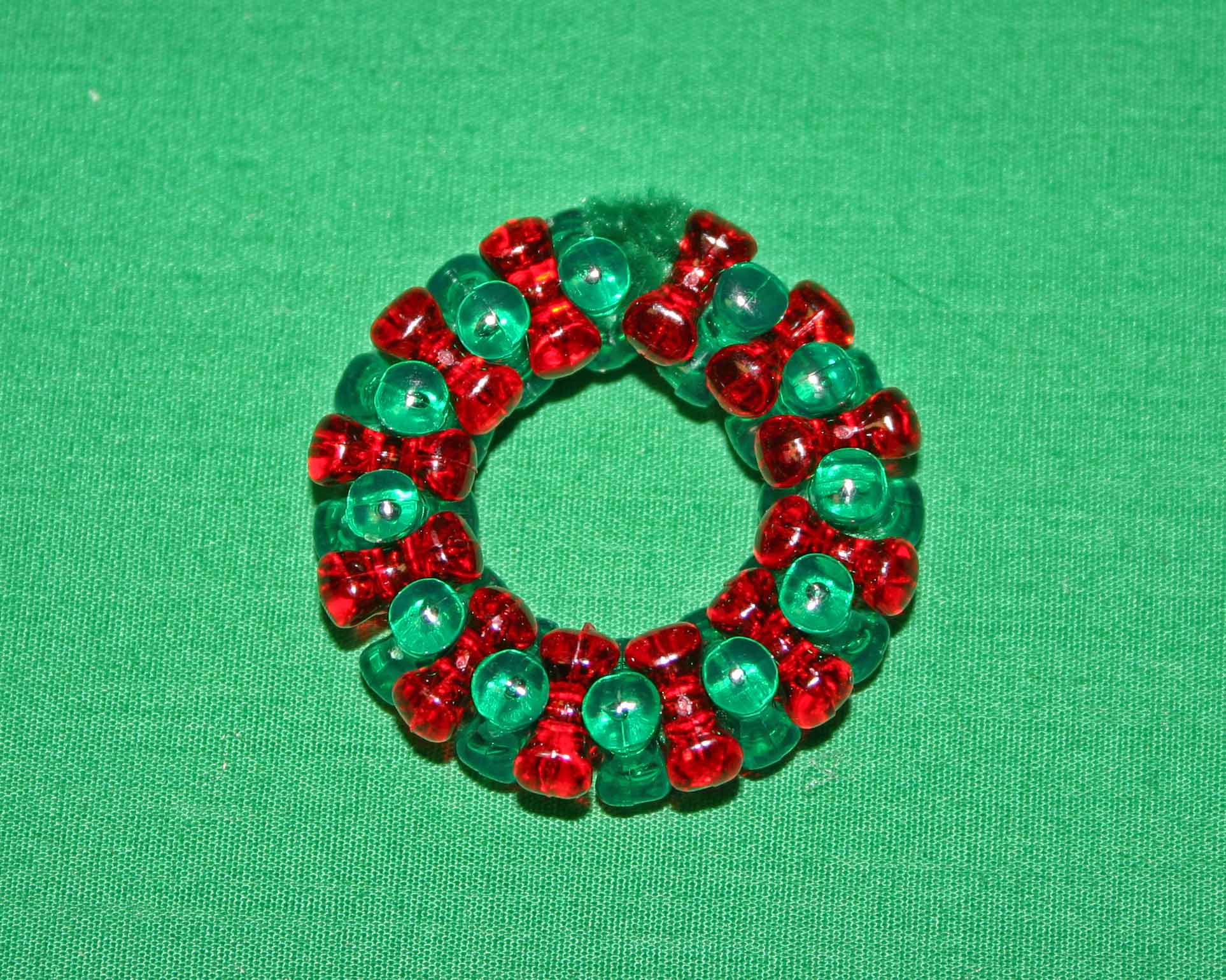 Beaded Christmas wreath red green clear finished circle