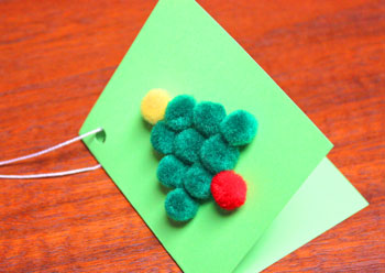 Christmas Tree Gift Tag finished with pom poms