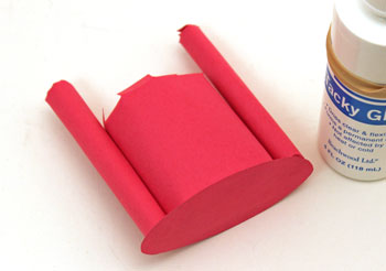 Construction Paper Nutcracker Doll step 6 glue shoulders