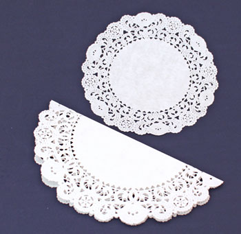 Easy Angel Crafts Doily Paper Angel step 1 fold larger paper doily in half