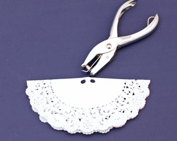 Easy Angel Crafts Doily Paper Angel step 10 punch holes on both sides of the center