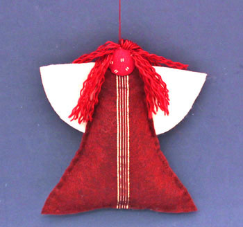 Easy Angel Crafts Felt Triangle Angel finished against a blue background