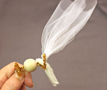 Easy Angel Crafts Tulle Angel step 12 pull the tulle ends firmly