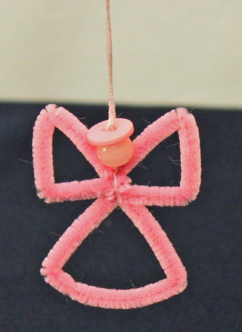 Easy Angel Crafts Wire Cross Angel finished and hanging on an ornament hanger