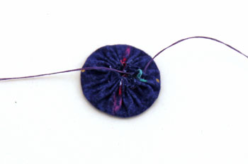 Easy Angel Crafts Yo Yo Angel Ornament step 4 pull threads firmly and tie knot