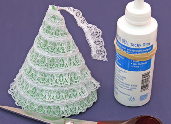 Easy Christmas Crafts Construction Paper Christmas Tree step 6 continue wrapping the lace rows