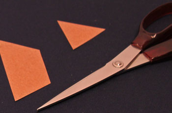 Easy Christmas Crafts Construction Paper Triangles Christmas Tree step 2 cut across brown triangle