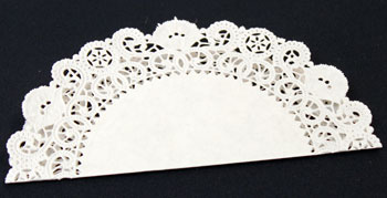 Easy Christmas Crafts Paper Doily Cone Ornament step 2 fold the paper doily in half