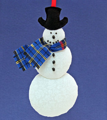 Easy Christmas Crafts Snowman finished ornament hanging from ribbon