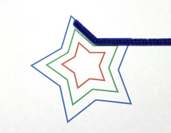 Easy Christmas Crafts Three Stars Chenille Ornament step 1 make the first bend in the blue chenille wire