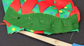 Easy Christmas Crafts Woven Ribbon Christmas Tree Door Hanger step 12 finish attaching felt strip