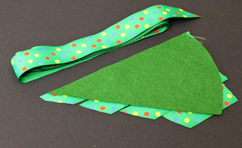 Easy Christmas Crafts Woven Ribbon Christmas Tree Door Hanger step 4 cut pieces of first ribbon