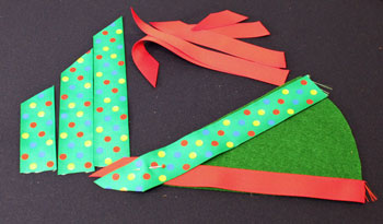 Easy Christmas Crafts Woven Ribbon Christmas Tree Door Hanger step 6 begin weaving ribbon