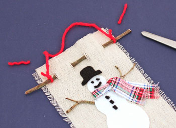 Easy Christmas Crafts Felt and Twig Snowman step 13 trim yarn