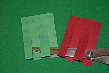 Easy Christmas Crafts paper basket cone cut strips from fold edge