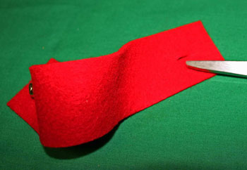 Easy felt crafts napkin ring red with bell cut buttonhole