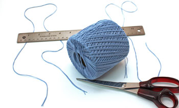 Easy paper crafts pocket calendar step 11 measure and cut yarn