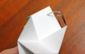 Folded Paper Squares Star step 14 make hole for hanger