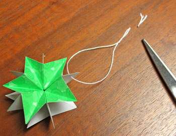 Folded Paper Squares Star step 17 make hanging loop