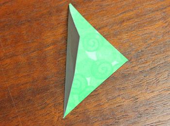 Folded Paper Squares Star step 3 fold square on the diagonal