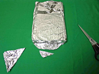 Frugal fun crafts aluminum foil trivet fold foil trim excess on second flap