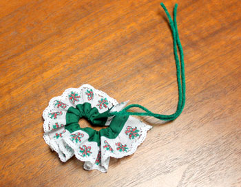 Lace and Seam Binding Flower Ornament step 6 pull yarn to make circle