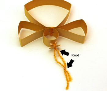 Paper Strips Angel Ornament step 11 tie knots in yarn