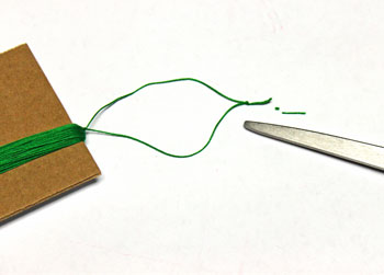 Ribbon and Bell Tassel Ornament step 8 make hanging loop