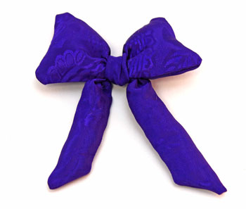 Stuffed Bow Decoration purple finished on display