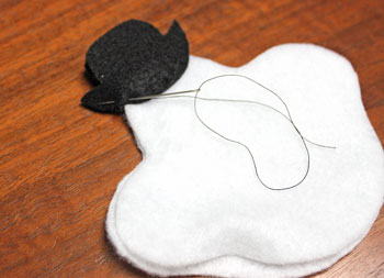 Stuffed felt snowman ornament step 5 sew hats together