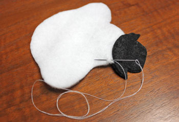 Stuffed felt snowman ornament step 7 begin sewing body