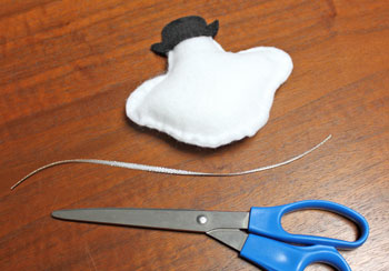 Stuffed felt snowman ornament step 9 cut ribbon for loop