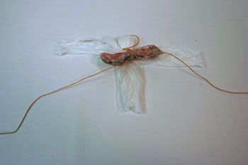 Easy Angel Crafts - Yarn Angel - Pull gold yarn to each side